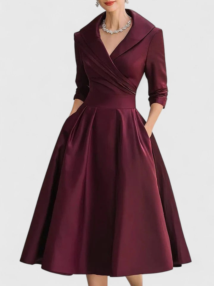 Ewelina – Elegantes Midikleid mit Wickeloptik und ausgestelltem Rock
